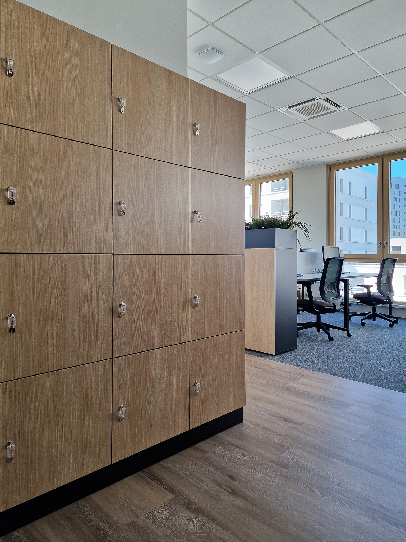 Tertia Solutions, expert en aménagement d'espaces de travail - Openspace casiers - Herbalife